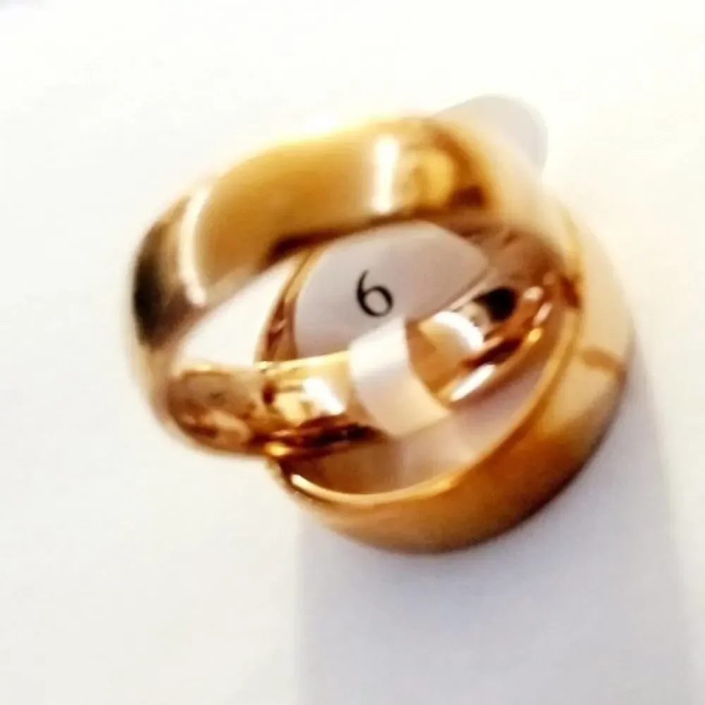New rose gold tone stainless steel‎ size 8
